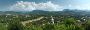 Panorama of Luang Prabang, north Laos, seen from Phu Si hill. This view features the Nam Khan river on the left, and the Luang Prabang airport on the very far left.
